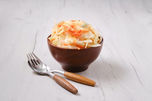 ?lay bowl with homemade pickled cabbage
