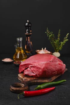 Raw beef top round meat, whole uncut section