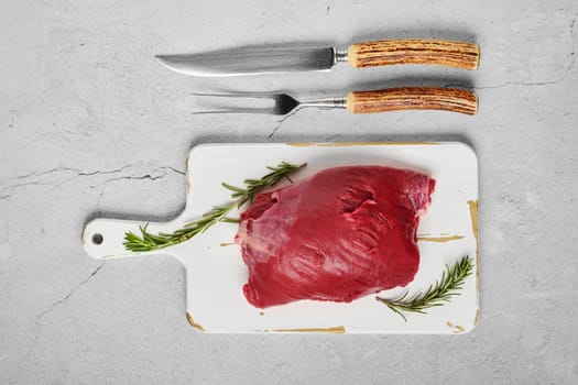 Raw beef shoulder boneless meat on concrete table