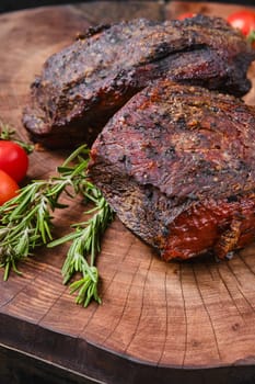 Slow cooking concept - baked beef top round meat, closeup view