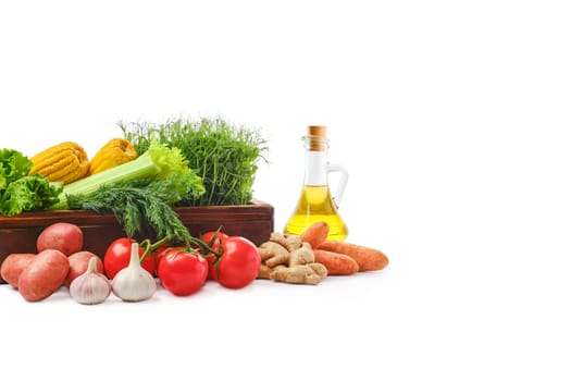 Heap of fresh vegetables and herbs on white background. World vegan day concept.