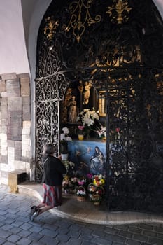 Faithful in prayer in the chapel of Our Lady of the Kamenita vrata (Stone Gate) in Zagreb, Croatia