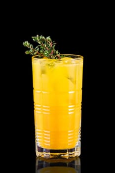 Cold orange lemonade with thyme flavor