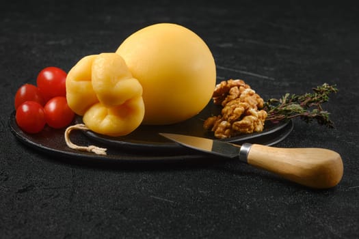 Delicious pulled caciocavallo yellow cheese on a plate