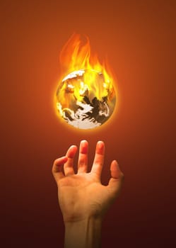 Conceptual photography featuring the planet on fire.