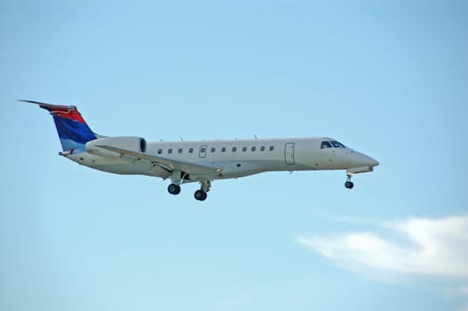 EMbraer ERJ-135 regional jet airplane approaching for landing