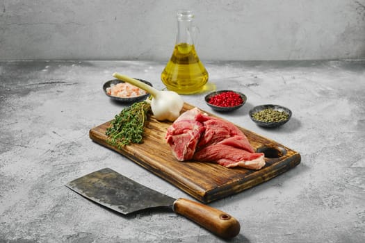 Raw uncooked lamb leg, chump off shank