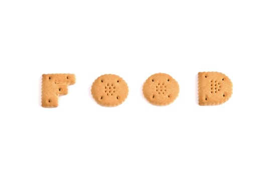 the word FOOD spelled in letter cookies and isolated on white background