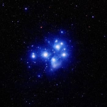 This is a true colour image of the Pleiades star cluster, also known as the "Seven Sisters"""