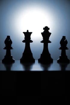 Low key Chess pieces in the studio.
