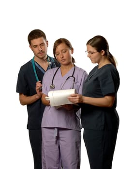 three medical people working together as a team