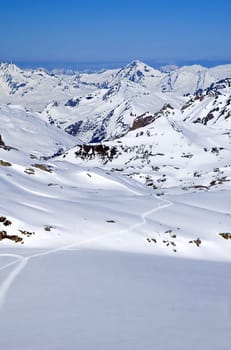 mountain landscape with visible trail at the bottom and copy-space