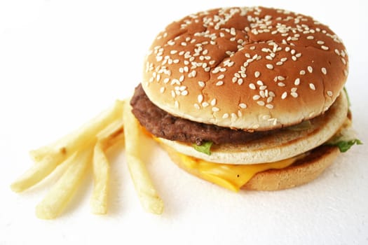 Isolated beef burger with cheese