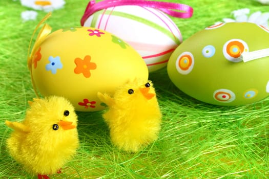 Painted Colorful Easter Eggs on green Grass