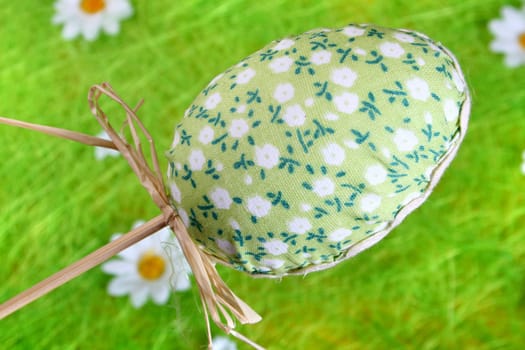 Painted Colorful Easter Eggs on green Grass