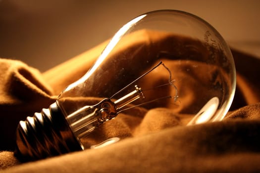 light bulb lamp on brown cloth