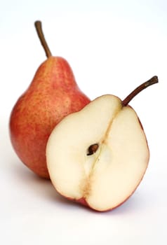 Two red pears on a white background