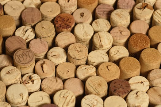 A group of red and white wine corks.
