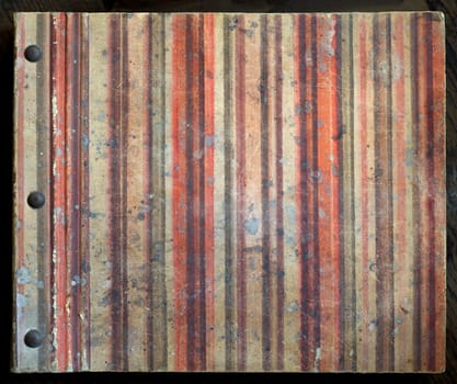 Old rugged, damaged and stained book cover.