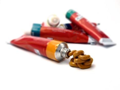 tubes of artists paint  on white ground  differential focus