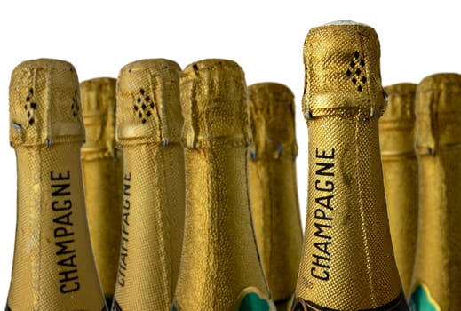 CHAMPAGNE BOTTLES against a white ground  differential focus