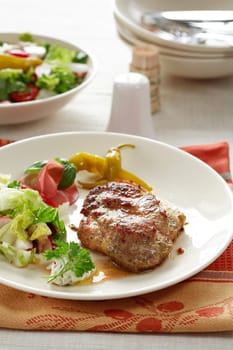 Delicious steaks with vegetable salad