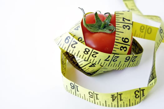 Tomato with measuring tape