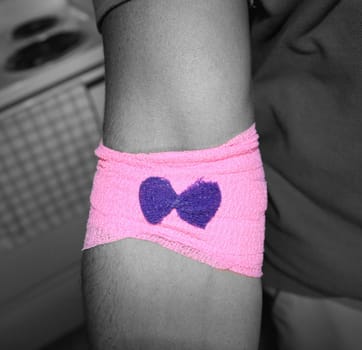 A self-portrait after donating blood to the Red Cross.  PS CS3 black and white, with exception of the wrap and bow.