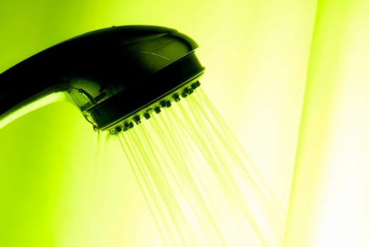 backlit showerhead with green overall color