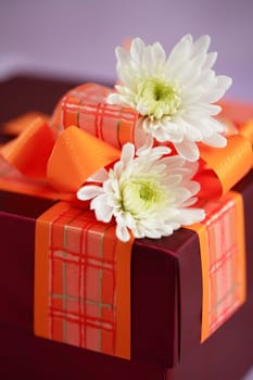Present decorated box with flowers