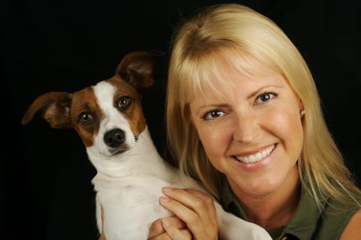 Attractive Woman Holds Her Jack Russell Terrier Dog