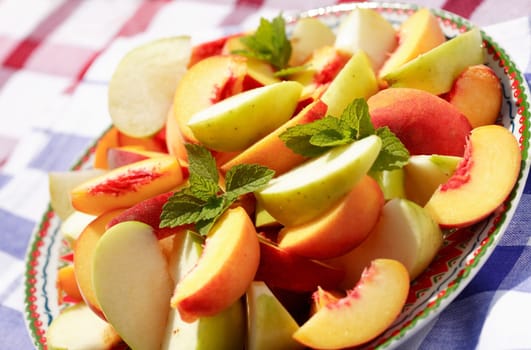 Summer refreshment - fresh fruits served in the garden