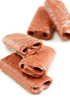 Sweet chocolate rolls isolated on white