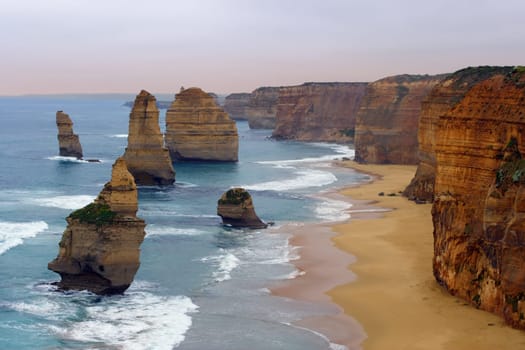 The Twelve Apostles along the Great Ocean Road, Australia.  Photo was taken in December 2004 before the 'apostle' in the front had fallen.