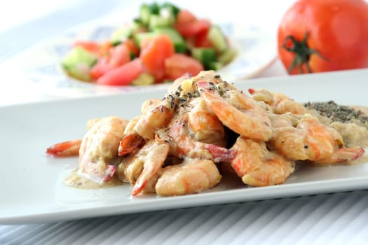 Shrimps dish with sauce & salad
