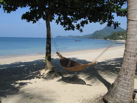 Hammock on white sandy beach, Ko Jum, Thailand