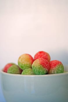 Red, yellow and green coloured boiled sweets