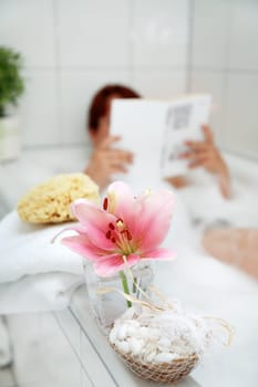 Taking a bath and relaxing with the book