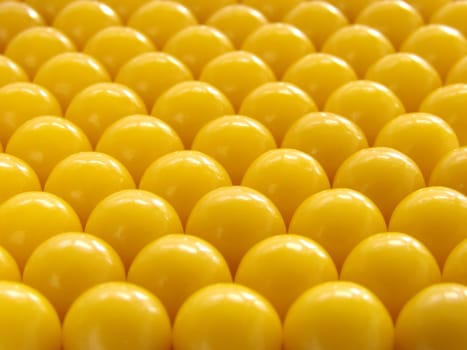 yellow vitamin pills background
