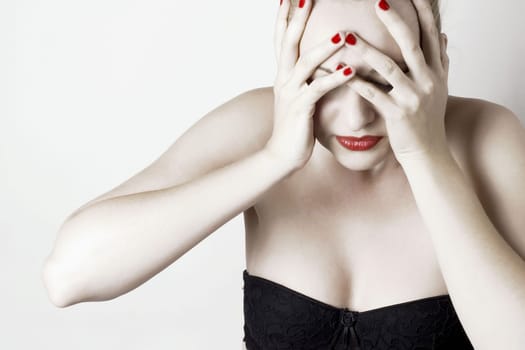 Beautiful sensual woman with headache/ pain. White background.