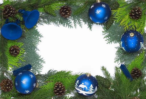 Christmas frame with blue balls and bells isolated on white
