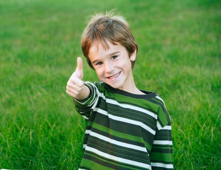 Handsome Little Boy Giving a Thumbs Up