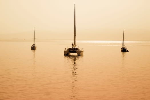 sailing boat anchored in a port in Sardinia