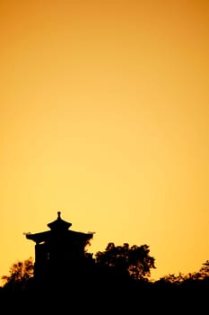 Chinese Temple silhouetted against the sunset