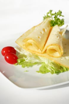 Two cheese rolls with salad and tomato