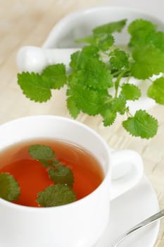 Cup of mint tea with mint