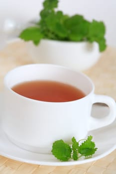 Cup of mint tea with mint