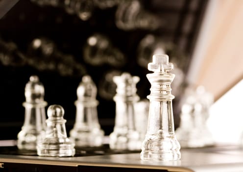 Chess - a game for two people that is played on a board with 64 black and white squares called a chessboard.