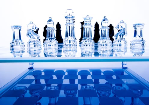 Chess - a game for two people that is played on a board with 64 black and white squares called a chessboard.