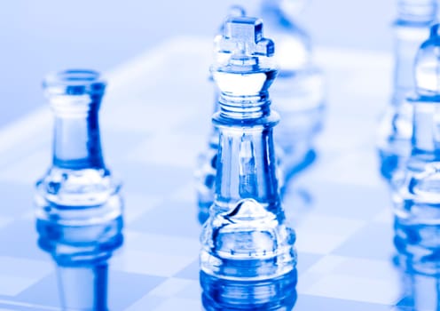 Chess - a game for two people that is played on a board with 64 black and white squares called a chessboard.